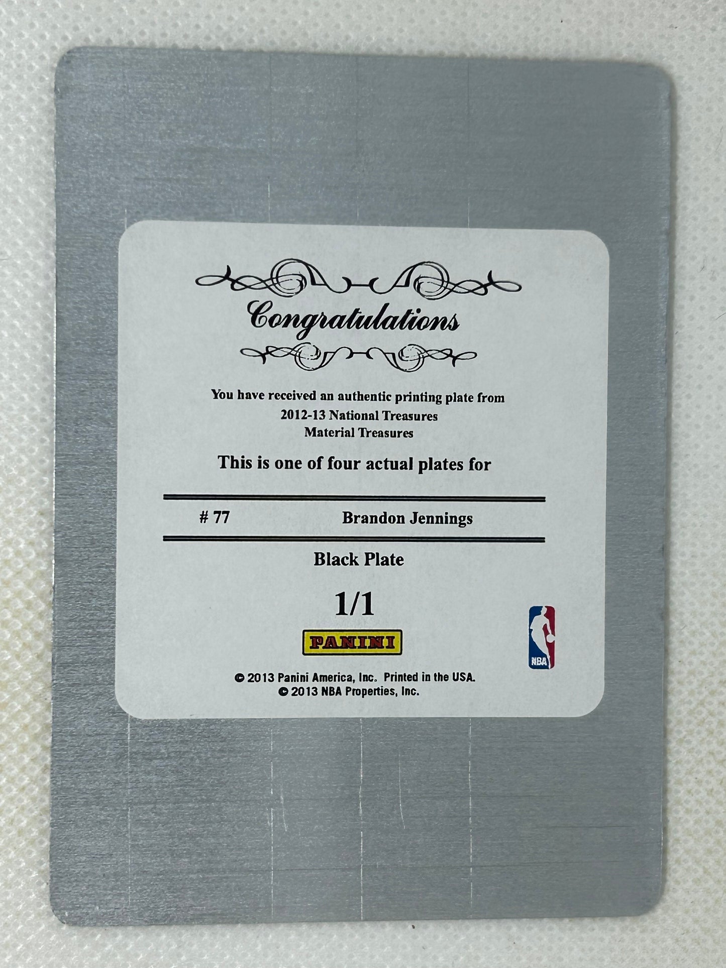 2012-13 Panini National Treasures Material Treasures Printing Plate Black 1/1 Brandon Jennings #77 Milwaukee Bucks