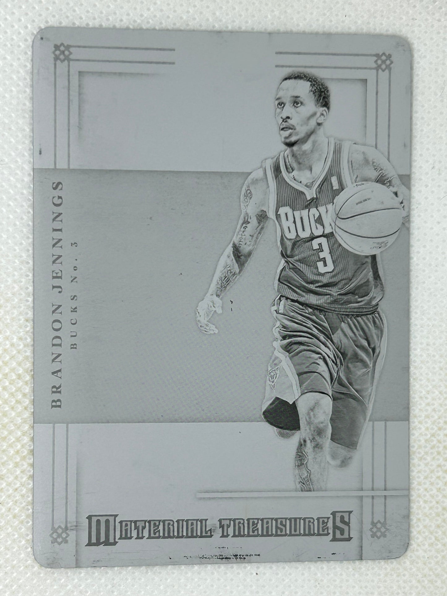 2012-13 Panini National Treasures Material Treasures Printing Plate Black 1/1 Brandon Jennings #77 Milwaukee Bucks