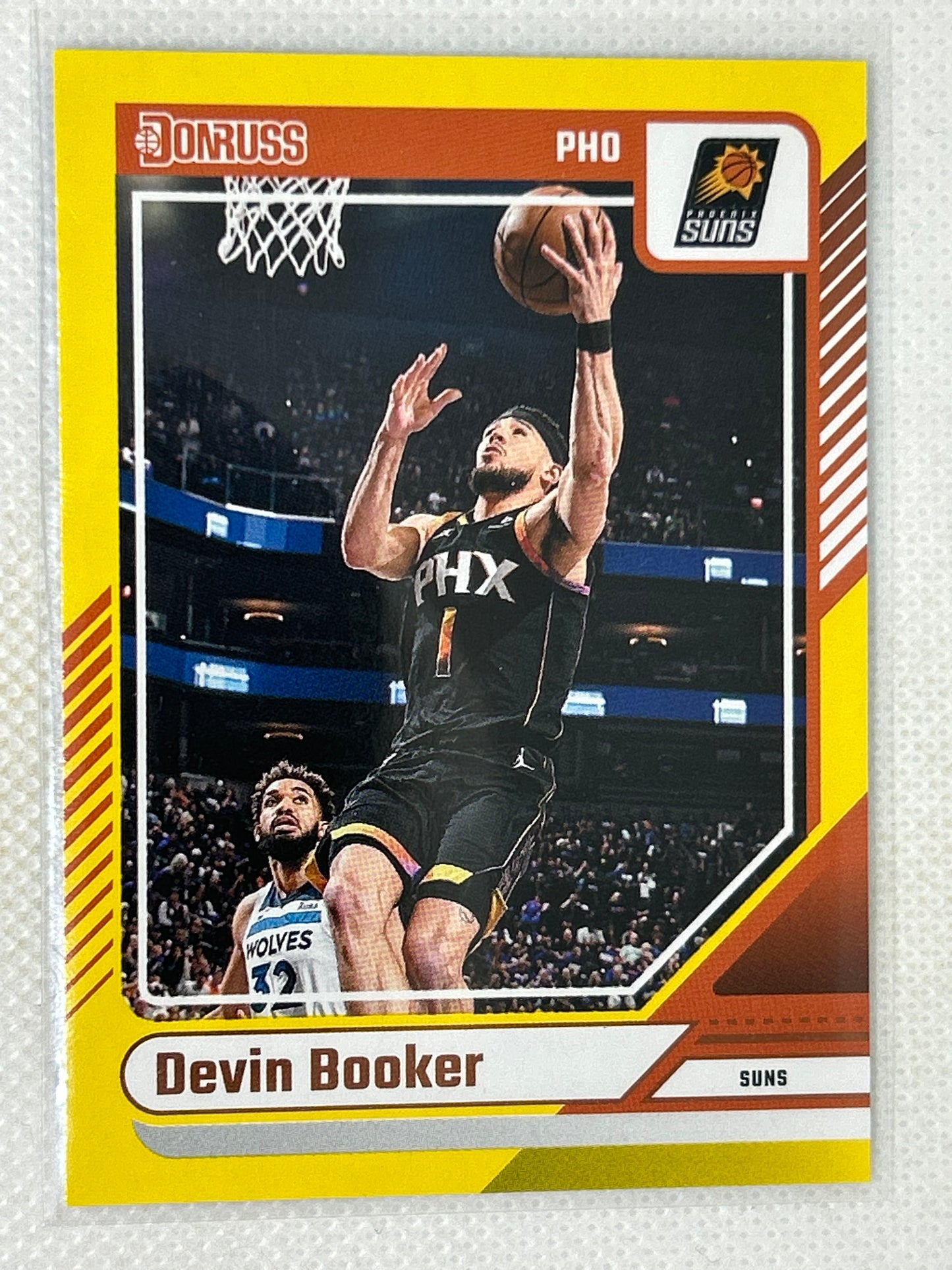 2024-25 Panini Donruss Yellow Flood Devin Booker #115 Phoenix Suns