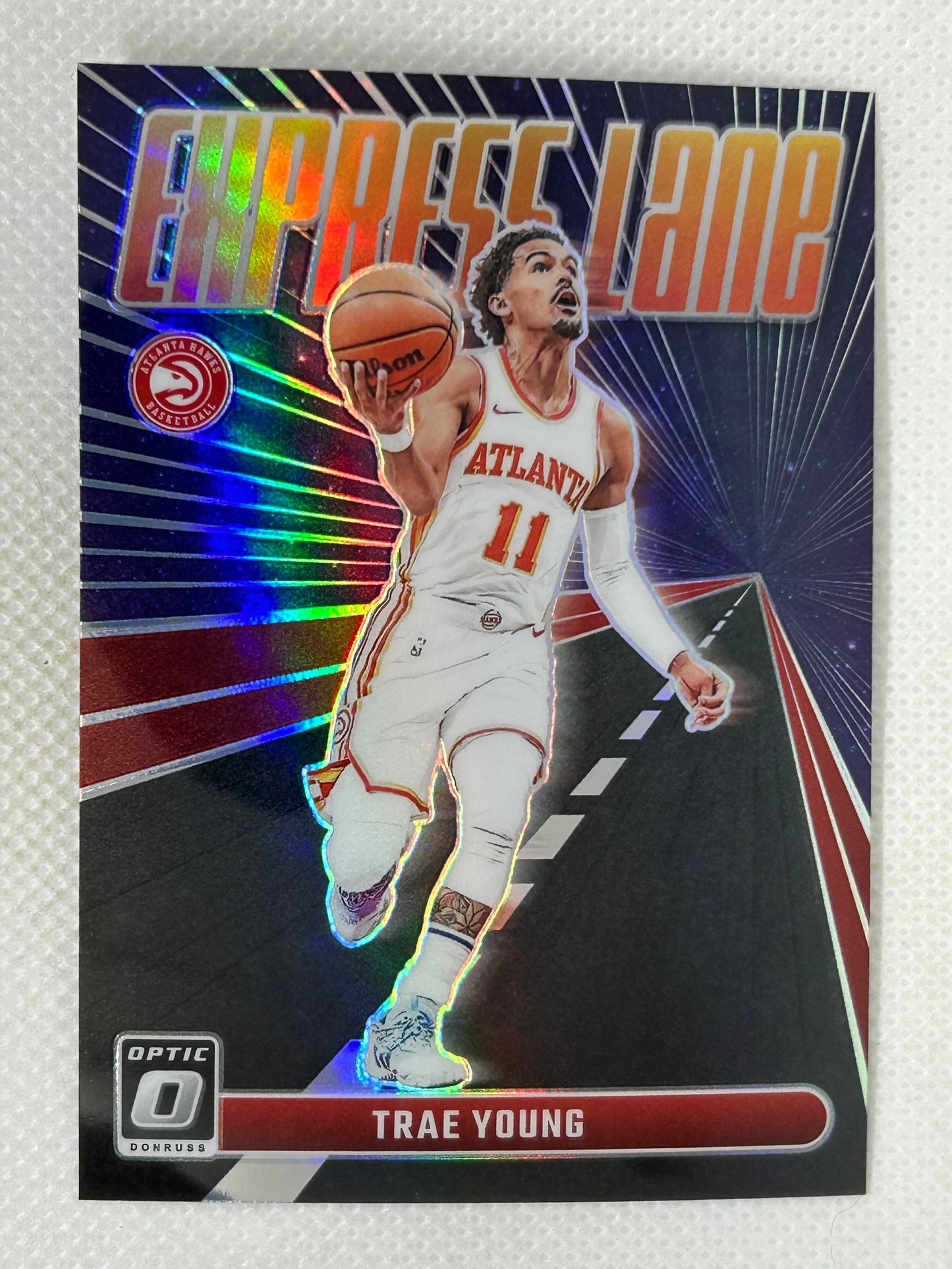 2023-24 Panini Optic #22 Express Lane Purple Trae Young Atlanta Hawks
