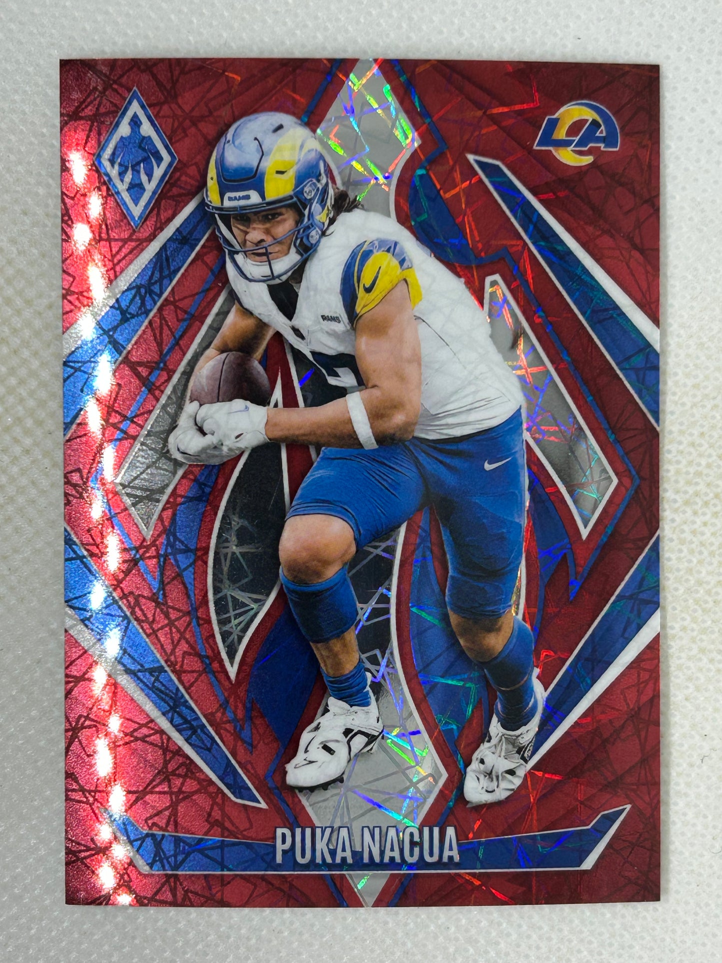 2024 Panini Phoenix Red Laser /199 Puka Nacua #118 Los Angeles Rams
