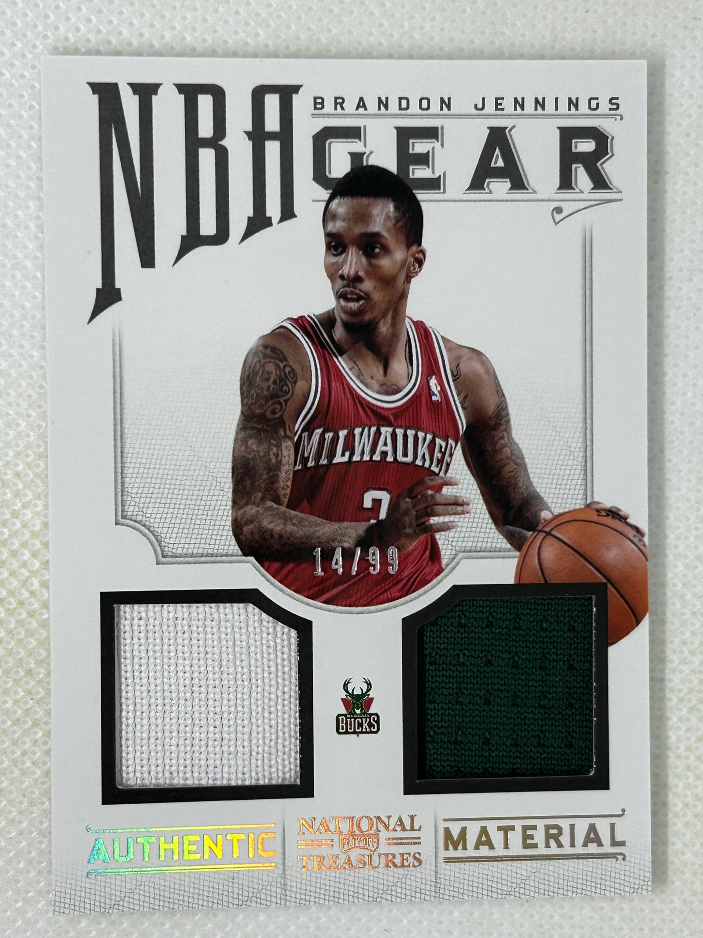 2012-13 Panini National Treasures NBA Gear Combos /99 Brandon Jennings #10 Milwaukee Bucks