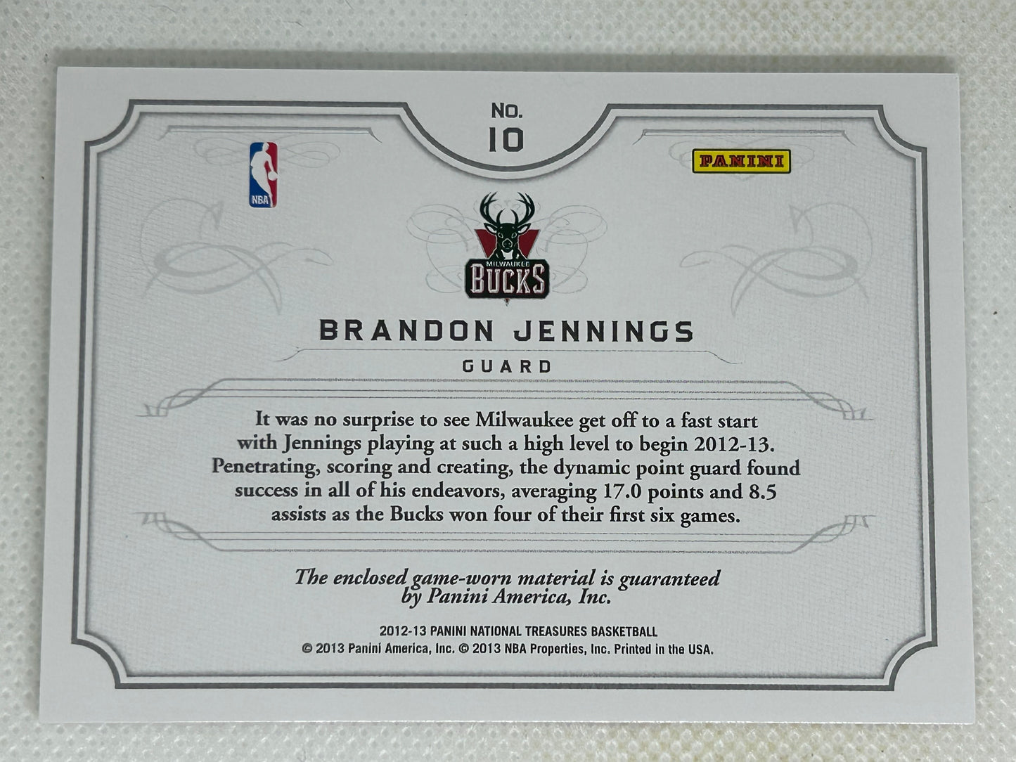 2012-13 Panini National Treasures NBA Gear Combos /99 Brandon Jennings #10 Milwaukee Bucks