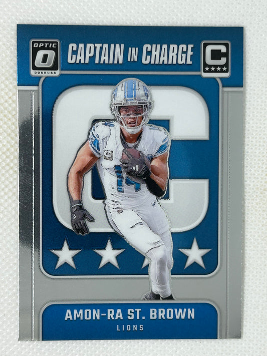 2024 Panini Donruss Optic Amon-Ra St. Brown Captain In Charge #5 Detroit Lions