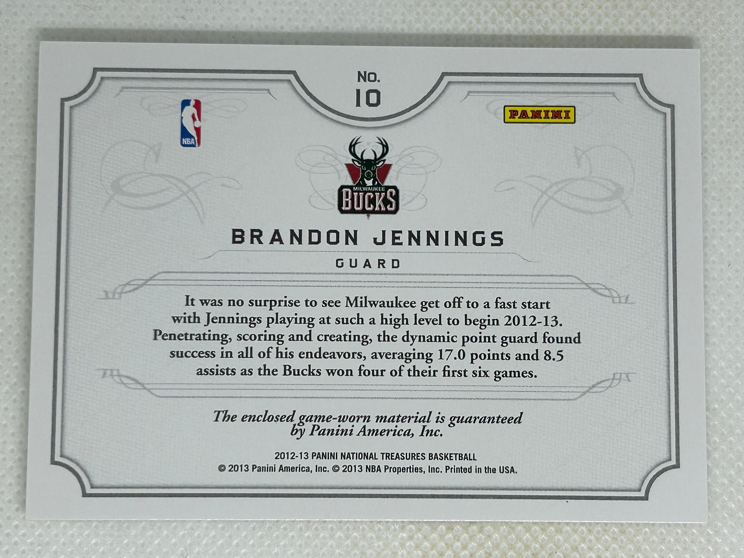 2012-13 Panini National Treasures NBA Gear Combos /99 Brandon Jennings #10 Milwaukee Bucks