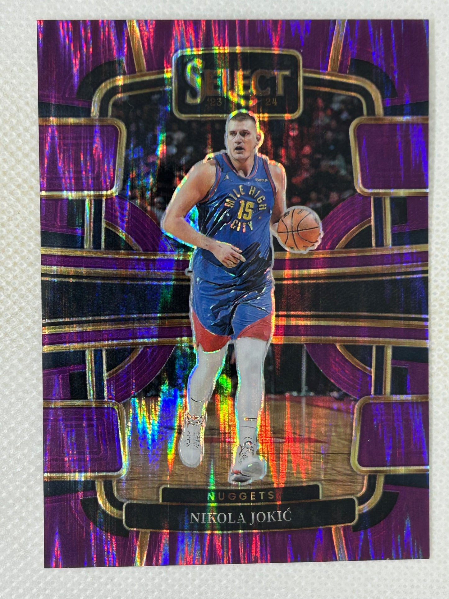 2023-24 Panini Select #32 Nikola Jokic Purple Flash Prizms #/175 Denver Nuggets